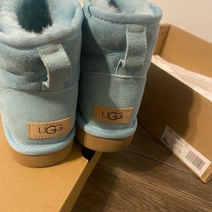 Brand New In The Box Ugg Classic , Never Worn just tried on once .